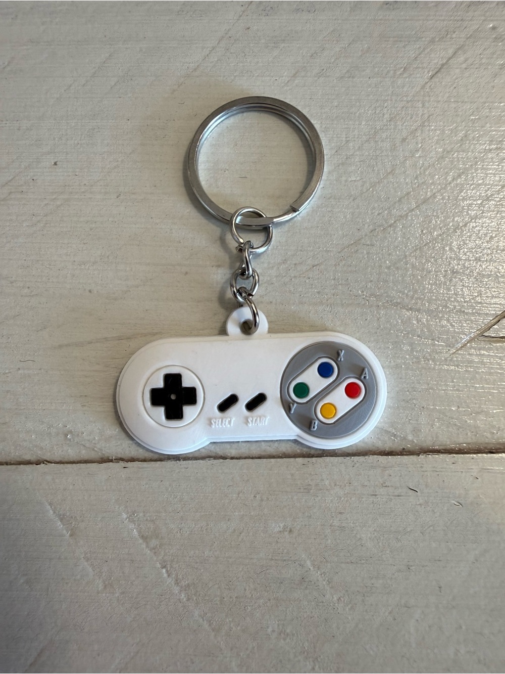 White Controller (SNES)
Classic Retro Gaming Controller Keychain Nostalgia Gam
